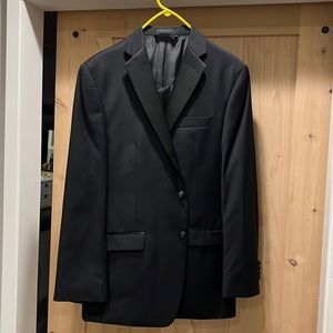 Ralph Lauren tuxedo jacket and Calvin Klein tuxedo pants.